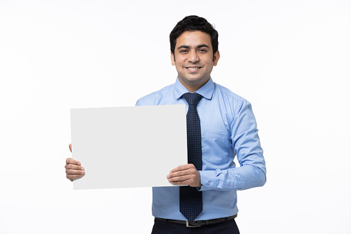 Young business man in white background