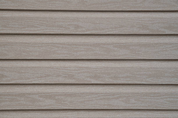istock External insulation with american siding imitating wood close 1407693108