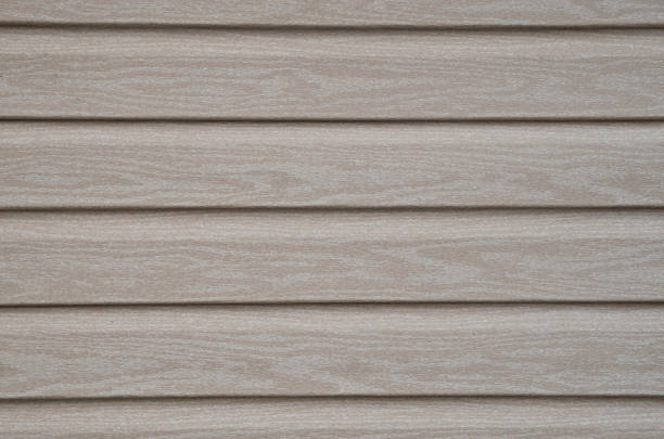 istock External insulation with american siding imitating wood close 1407693110