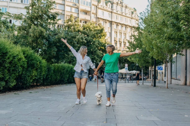 istock Cute female couple having fun on a sunny day 1407696338
