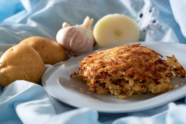 istock Homemade Hash brown potatoes, toppings on the side. 1407696547