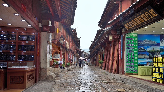 Lijiang Old Town, Lijiang City, Yunnan Province.  \nThe old Town of Lijiang is located in Lijiang City, Yunnan Province. It was built in the late Song and early Yuan Dynasties (late 13th century AD). It is located on the Yunnan-Guizhou Plateau with an area of 7.279 square kilometers and an altitude of 2,416 meters.  It is a famous historical and cultural city in China, a World cultural Heritage and a national 5A scenic spot.  The old town of Lijiang embodies the achievements of ancient Chinese urban construction and is one of the types of Chinese dwellings with distinctive characteristics and styles.  \nThe old town of Lijiang is one of the most popular tourist destinations in China.