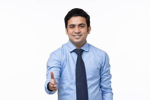 Young business man in white background