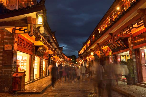 Lijiang Old Town, Lijiang City, Yunnan Province.  The old Town of Lijiang is located in Lijiang City, Yunnan Province. It was built in the late Song and early Yuan Dynasties (late 13th century AD). It is located on the Yunnan-Guizhou Plateau with an area of 7.279 square kilometers and an altitude of 2,416 meters.  It is a famous historical and cultural city in China, a World cultural Heritage and a national 5A scenic spot.  The old town of Lijiang embodies the achievements of ancient Chinese urban construction and is one of the types of Chinese dwellings with distinctive characteristics and styles.  The old town of Lijiang is one of the most popular tourist destinations in China.The old city is very charming and beautiful at night.