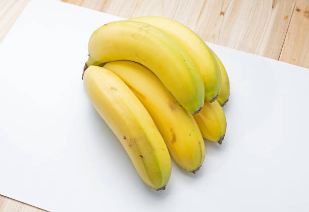 istock Fresh and delicious yellow bananas 1407701352