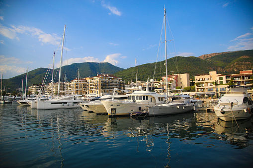 Modern luxury yachts in a marina in Tivat, Montenegro.