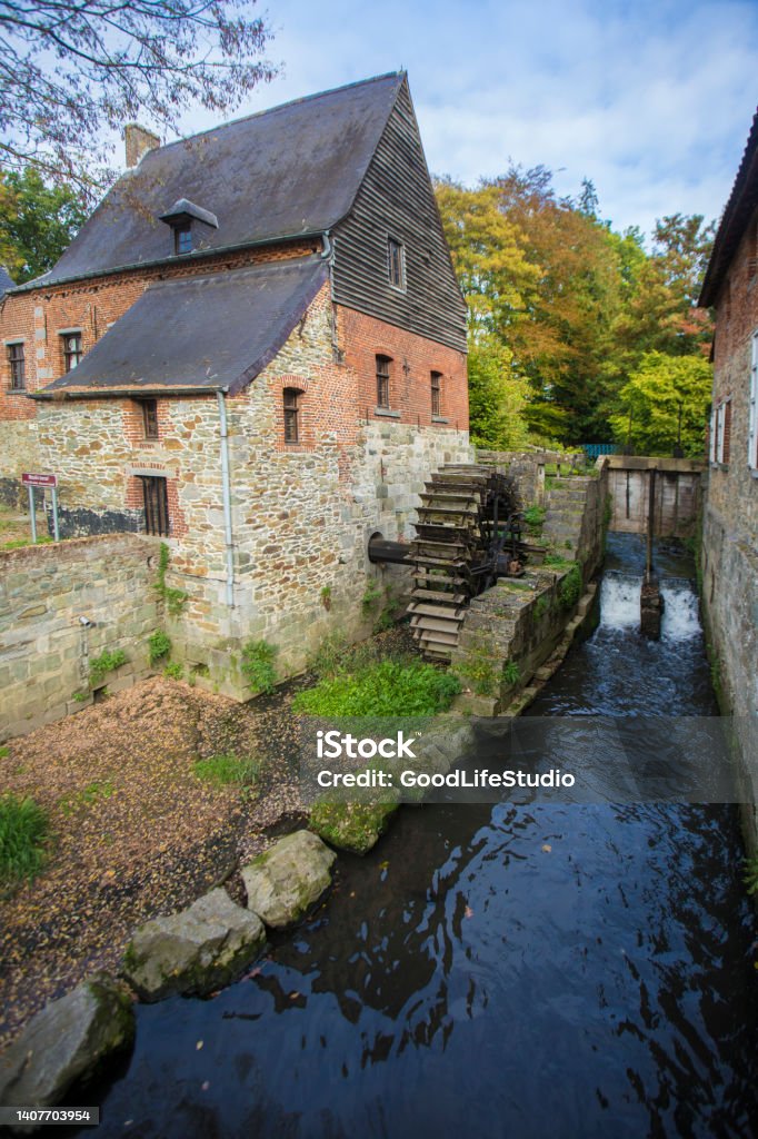 Watermill Watermill in village Braine-le-Chateau, Belgium. Water Wheel Stock Photo