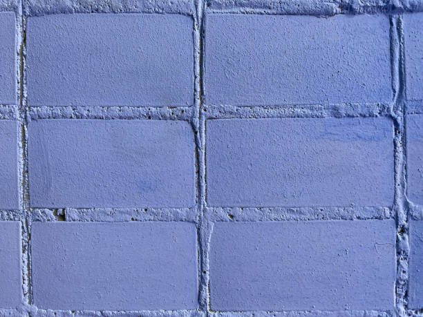istock abstract textured background, brick wall painted with paint 1407707728
