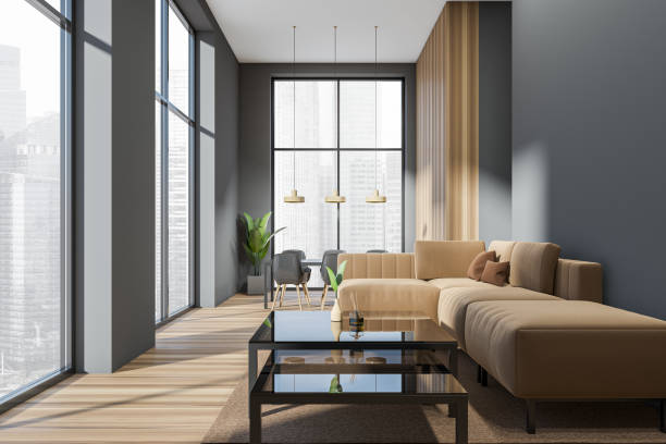 istock Grey living room interior with couch and seats, panoramic window 1407710344