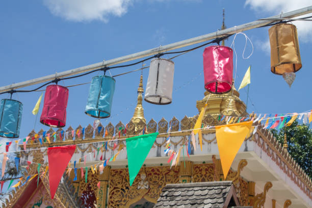 istock Various colored lanterns and flags hanging in the temple 1407710909