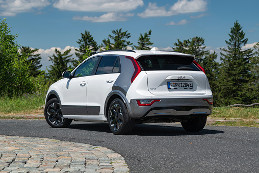 Frankfurt, Germany - 28th June, 2022: Second generation of Kia Niro EV stopped on a street. The Niro is a popular electric vehicle from Kia in SUV/crossover segment on the European market.