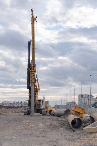 istock Large Land drilling machine on Building site. preparing the foundation base for new construction 1407716545