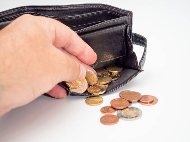 istock Euro bills and coins. Cash. 1407720023