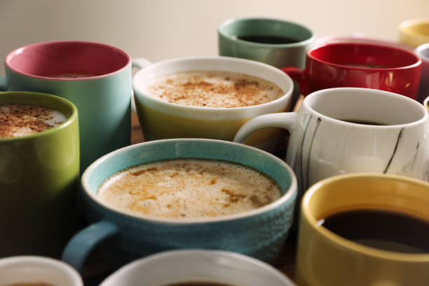 istock Many cups of different coffees on table, closeup 1407721328