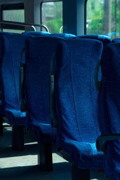 istock interior of commuter passenger train car 1407722193