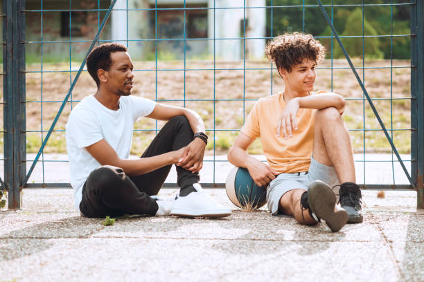 istock Friends relaxing after good basketball game 1407722270