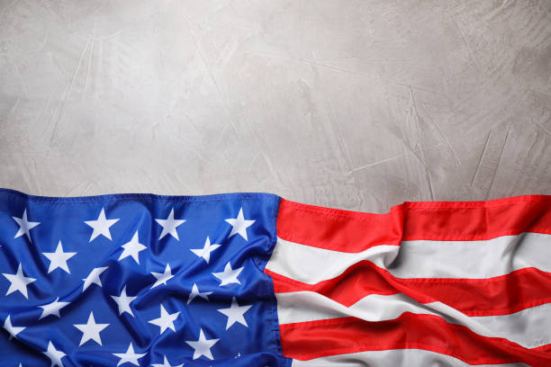 istock American flag on light grey background, top view. Space for text 1407722557