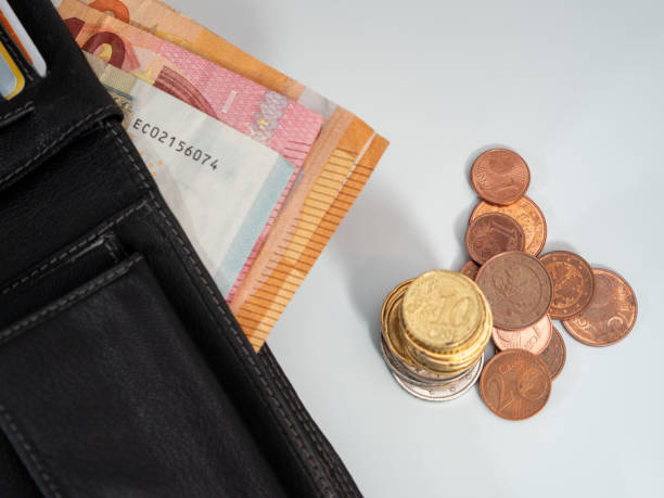 istock Euro bills and coins. Cash. 1407725030