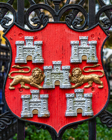 Crest of the City of Winchester on a gate in Winchester, UK.