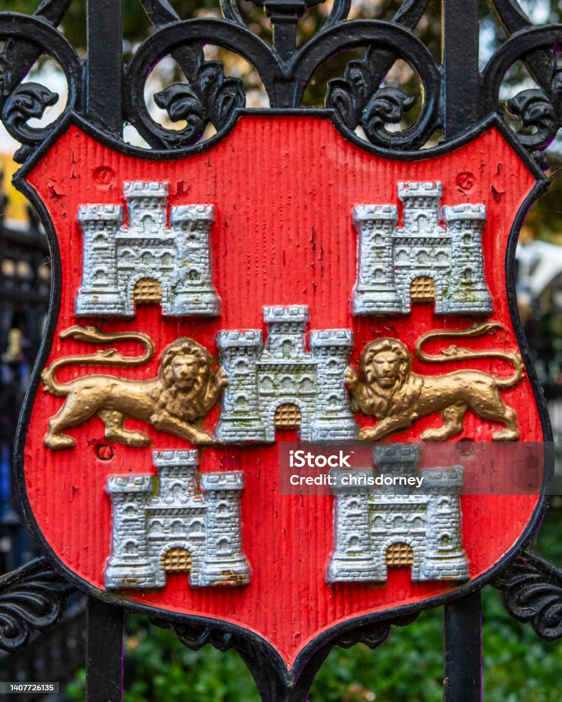 City of Winchester in Hampshire, UK Crest of the City of Winchester on a gate in Winchester, UK. Coat Of Arms Stock Photo