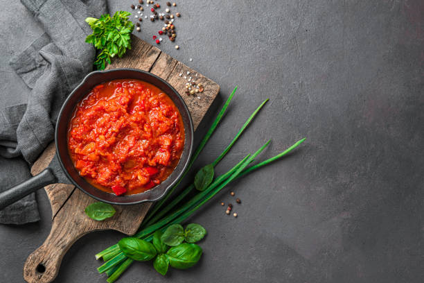 istock Classic tomato sauce on a dark background. 1407726502