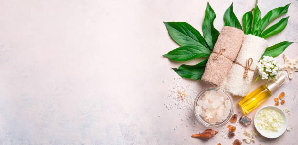Organic spa cosmetics and accessories on a light background.