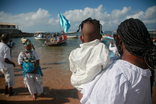 salvador, bahia, brazil - february 2, 2022: Candomble devotees and supporters of the African matriaz religion pay tribute to the orixa Yemanja in the city of Salvador.