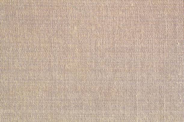 istock Abstract design background of grey beige coarse-grained intersection texture of rough fabric with an interlacing 1407730024