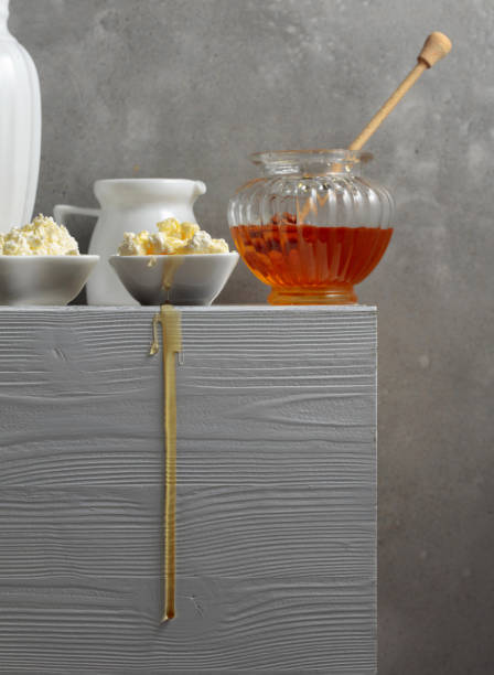 istock Fresh cottage cheese or ricotta with honey. 1407734037