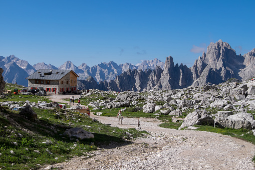 Trentino-Alto Adige, Italy - June 30, 2022: Trails and refuge in the mountains of Lavaredo in the Dolomites