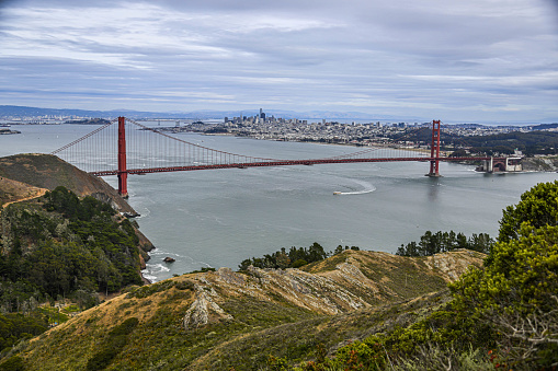 Golden Gate Bridge over San Francisco Bay with San Francisco in the background.