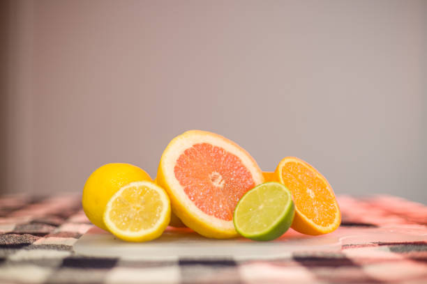 Fresh organic citrus fruit mix on cutting board