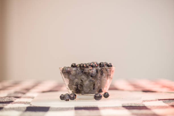 Fresh organic blueberries on cutting board