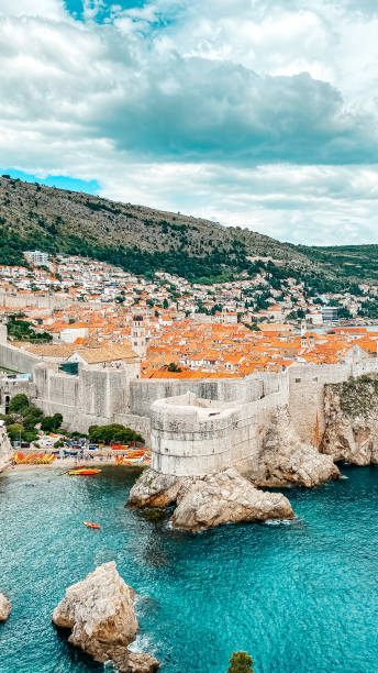 Overlooking Dubrovnik Old town View from the fortress of Dubrovnik old town dubrovnik walls stock pictures, royalty-free photos & images