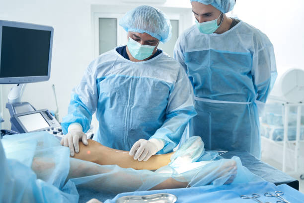 istock Phlebologists treating multifunctioning veins in the hospital 1407750462