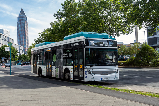 Frankfurt, Germany - 28th June, 2022: Modern electric bus Caetano e.City Gold on a street. The 100% electric e.City Gold model is equipped with a 349 kWh batteries pack providing an autonomy of more than 200 kilometers.