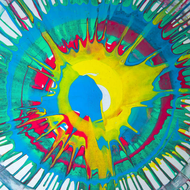 splatter splash real paint abstract sun centered spinning fluid vibrant green blue yellow red background messy splattered grunge style graphic design