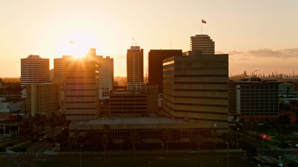 istock Sun Setting Behind Downtown Buildings in Corpus Christi, TX at Sunset 1407762278