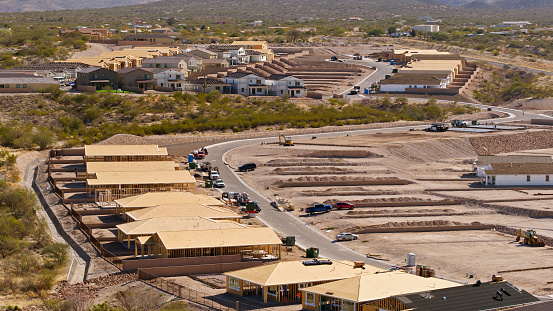 Aerial shot of housing construction in Vail, a suburb southeast of Tucson in Pima County, Arizona on a hazy day in spring.