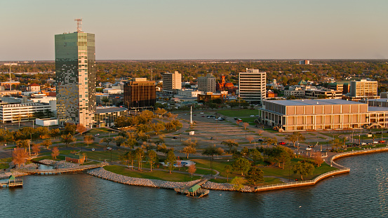 Aerial shot of Lake Charles in Calcasieu Parish, Louisiana. The shot includes the Capital One Tower, the tallest building in the city, which is still visibly damaged after Hurricane Laura. 
 
Authorization was obtained from the FAA for this operation in restricted airspace.