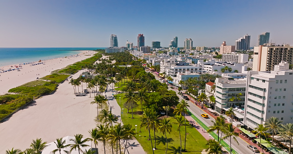 Drone shot of Ocean Drive in Miami Beach, Florida on a clear sunny day in spring.
