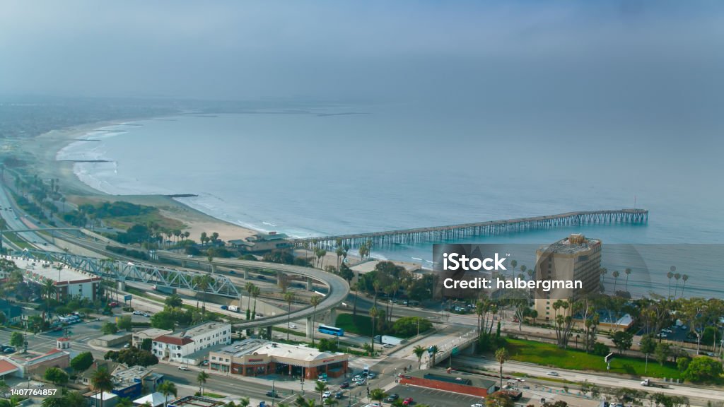 Hazing Morning in Ventura, CA - Aerial Aerial shot of Ventura, California on a summer morning, with the marine layer sitting over the city. Ventura Stock Photo