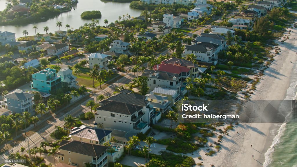 Houses on Hickory Island in Bonita Springs, FL Aerial shot of Bonita Springs, Florida on a clear sunny morning in spring. Bonita Springs is a coastal town between Naples and Fort Myers, with the nickname "Gateway to the Gulf". Florida - US State Stock Photo