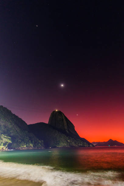 planetary alignment at dawn on the red beach of urca in rio de janeiro, brazil - urca imagens e fotografias de stock