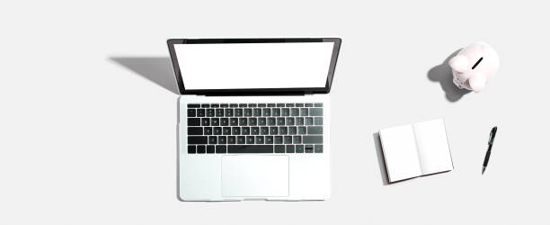 istock Laptop computer with piggy bank 1407768641