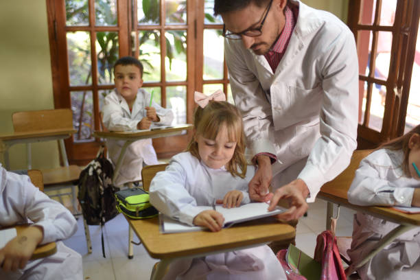 istock elementary school teacher in the classroom 1407771146