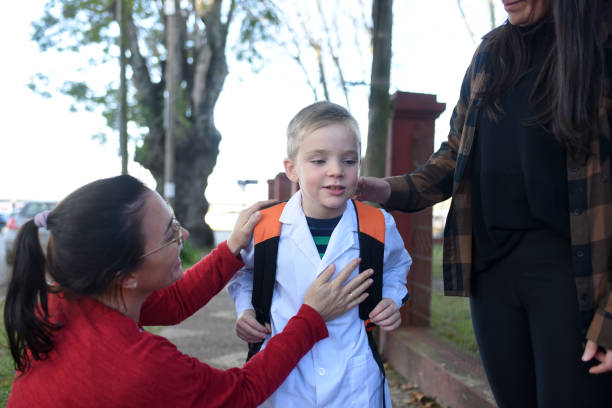 istock children arriving at school with their parents 1407771408