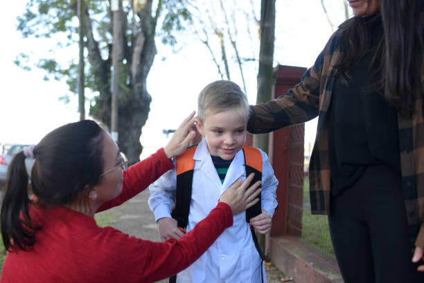 istock children arriving at school with their parents 1407771564