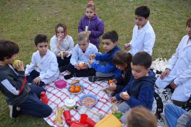 istock children eating fruit in the schoolyard 1407772609