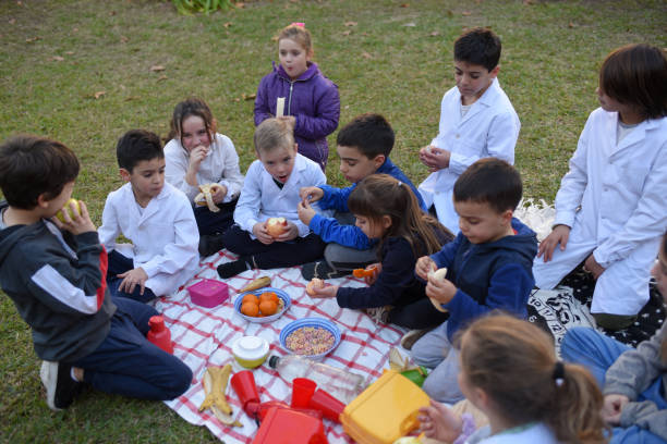 istock children eating fruit in the schoolyard 1407772625